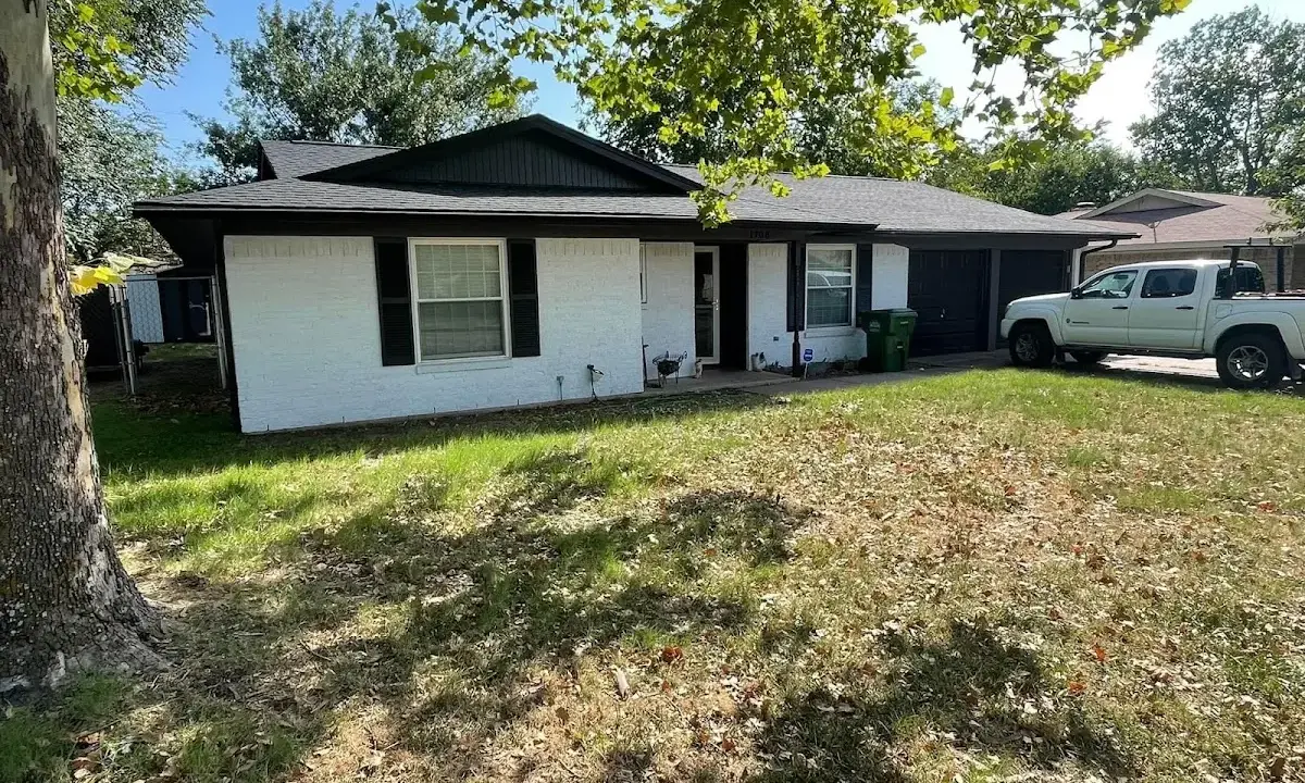 Professional roofing crew working on a residential roof in Carolina Forest