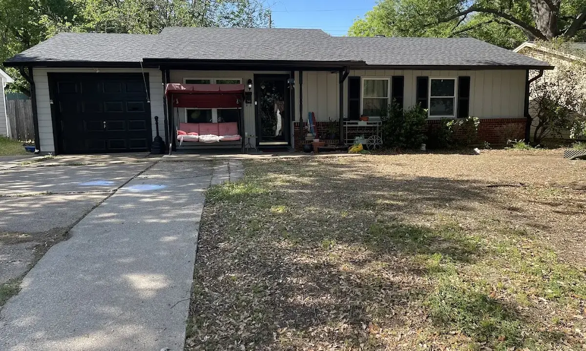 Roof Replacement crew at work on a residential roof in Carolina Forest